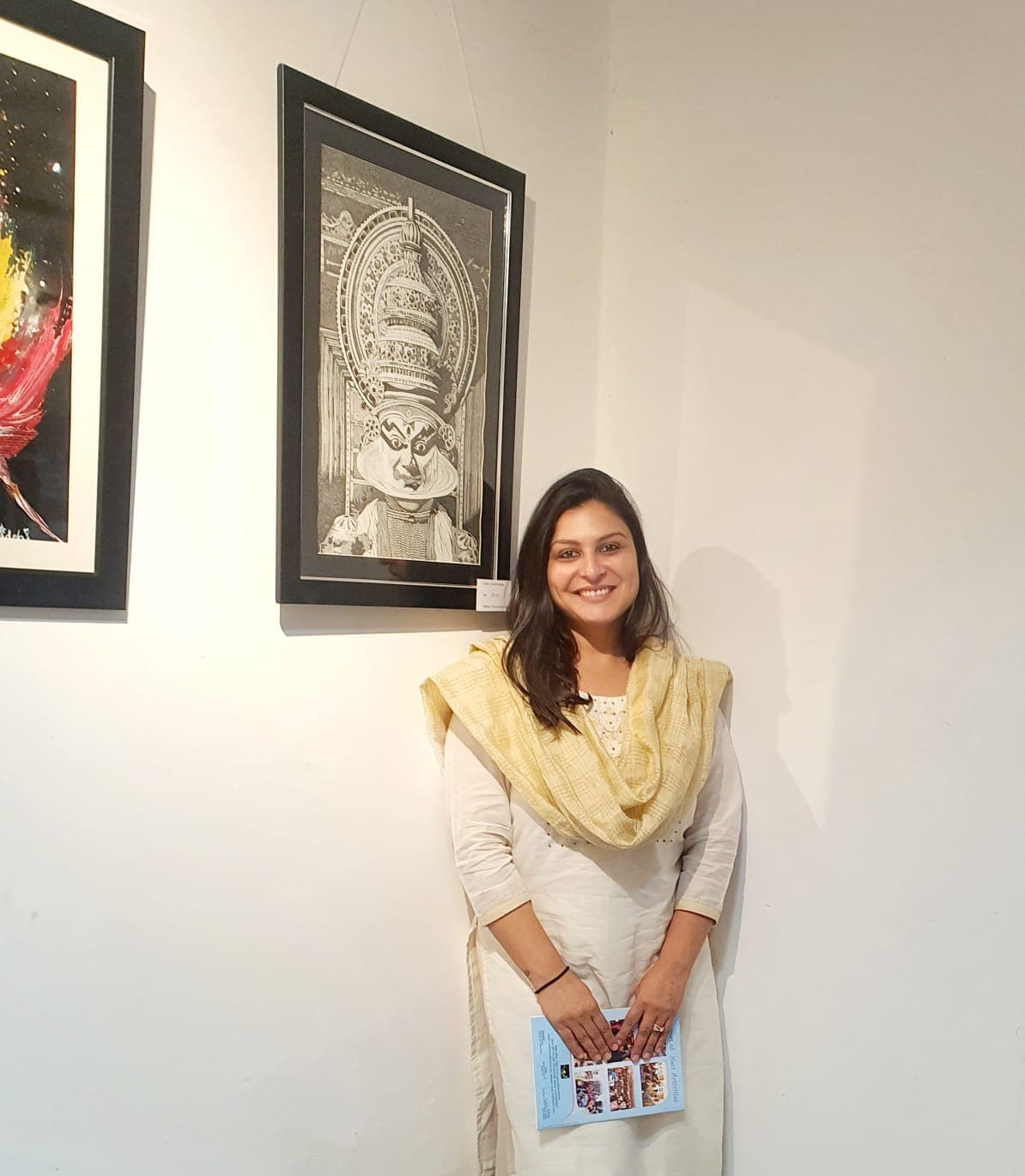 Guests viewing student artworks at the exhibition